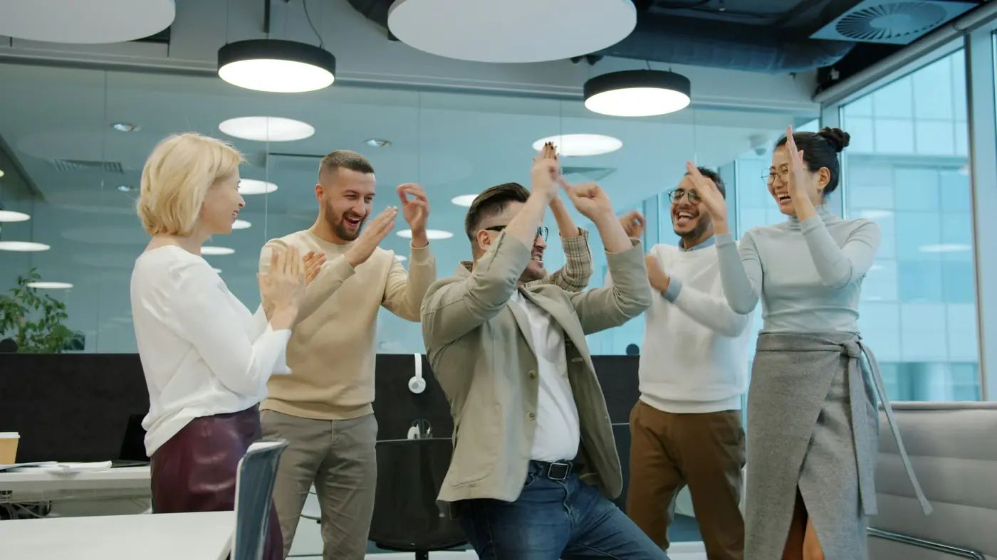 A team celebrating a successful project together